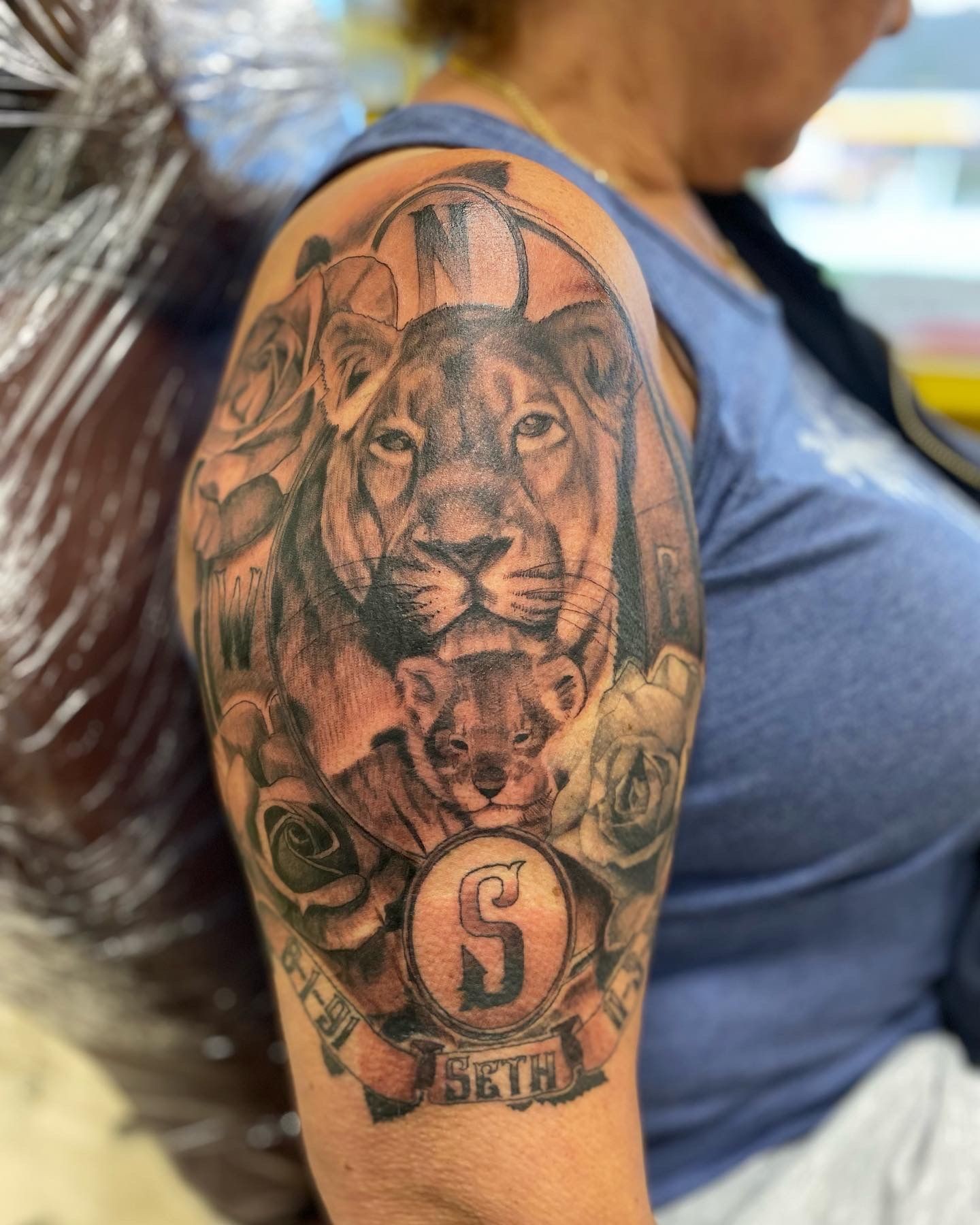 Black and grey Lion tattoo done at Azappa